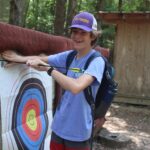 Teen helping at Archery